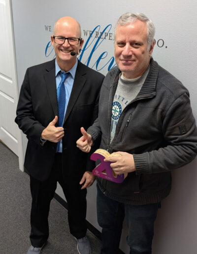 (L to R) Matt Lefler presents Jeff Chase's 20th Anniversary Award