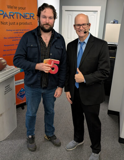 (L to R) Alex Ray receives his 15th Anniversary Award from Matt Lefler
